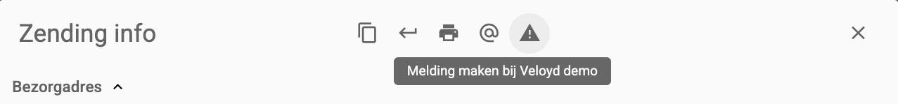 De bovenkant van Zending Info in het klantportaal met het waarschuwingsicoon en de tooltip Melding maken bij Veloyd demo